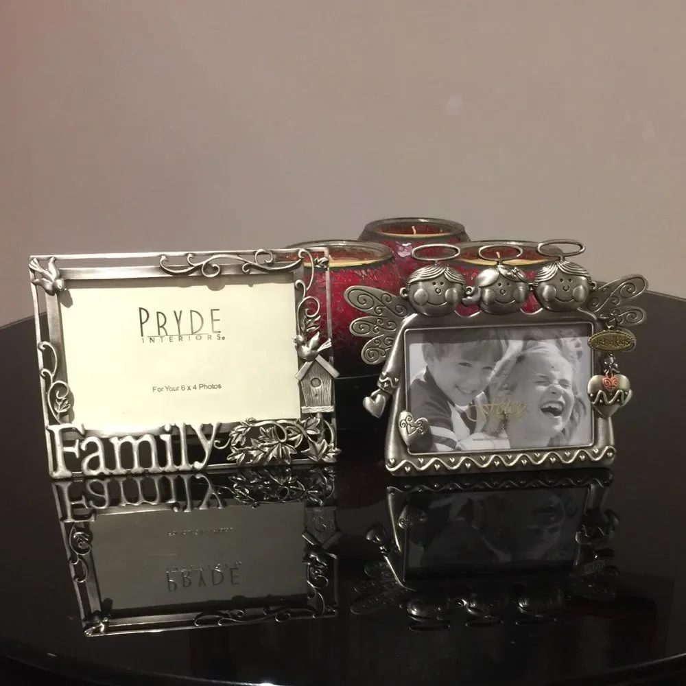 Two silver frames. Family and grandkids